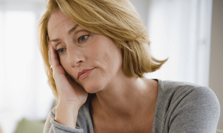 sad and tired matured woman